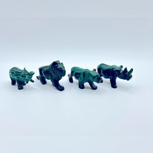 Set of 4 hand-carved malachite African animal figurines (lions, rhino, elephant)